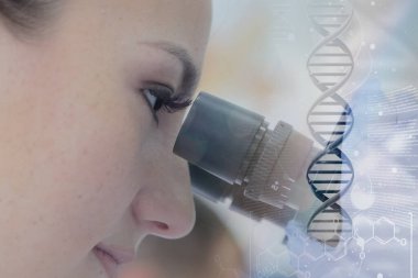 Laboratuvarda deney tüpleriyle çalışan iki genç bilim adamı...