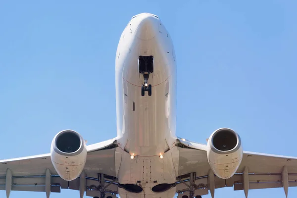 Passenger airplane landing in the airport runway. Passenger plan