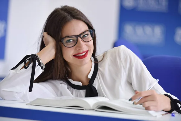 Stressed young female student of school of economics feeling fru