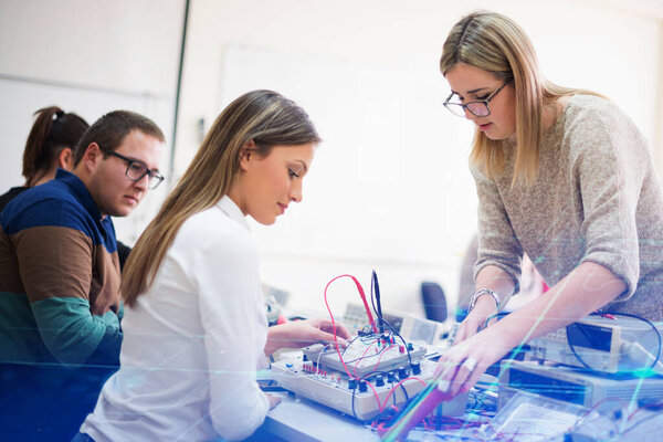 Group of young students  in technical vocational training with y