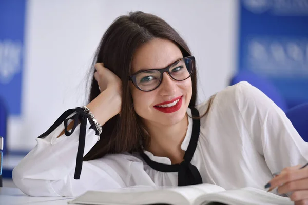 Stressed young female student of school of economics feeling fru