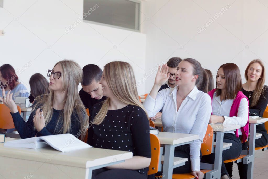 University students listening while Male professor explain lesso