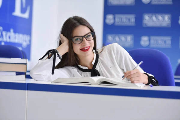 Stressed young female student of school of economics feeling fru