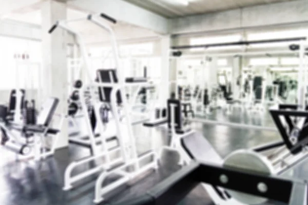 Blurred of fitness gym for background
