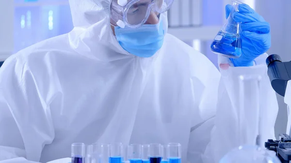 Scientist Ppe Suite Doing Some Research Checking Liquid Test Tube — Stock Photo, Image