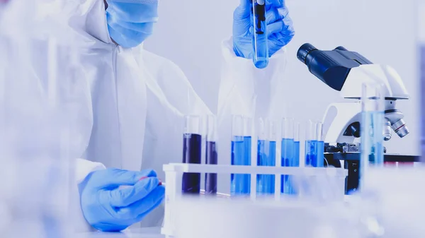 Scientist Ppe Suite Doing Some Research Checking Liquid Test Tube — Stock Photo, Image