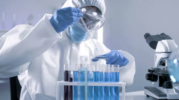 Scientist Ppe Suite Doing Some Research Checking Liquid Test Tube — Stock Photo, Image