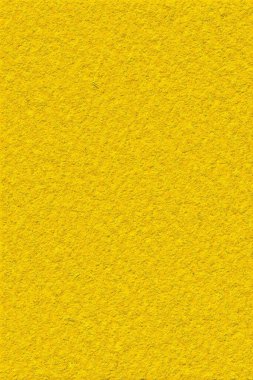 Sarı arkaplan ve büyük altın dokular.