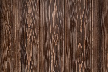 Tarla kuşlarının doğal arka planı. Dokulu ahşap yüzey. Koyu kahverengi.