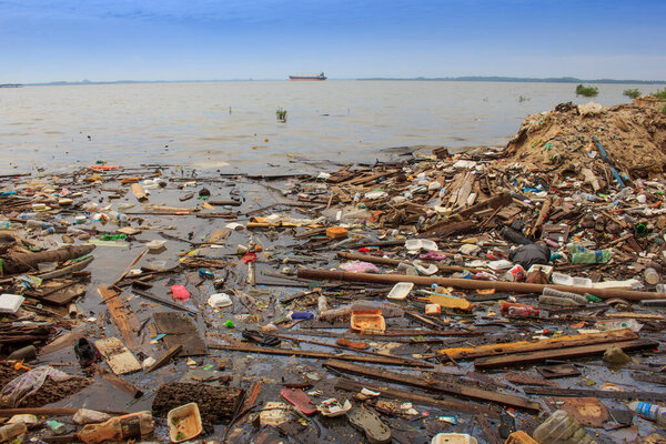 Plastic rubbish pollution on the seaside. Environmental problem concept