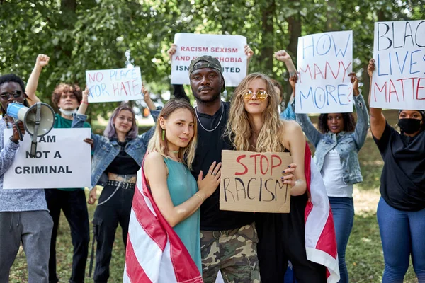 Lets be friendly and tolerant mixed race people together during protest — Stock Photo, Image