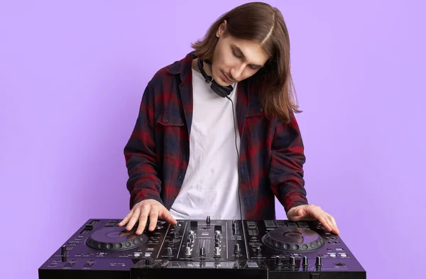 modern club DJ playing mixing music on vinyl turntable, isolated