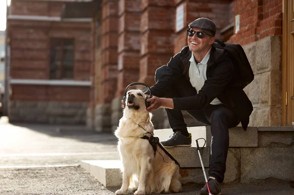 Blind guy have fun with dog guide — Stock Photo, Image