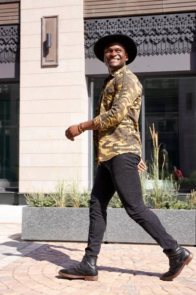 african american male model posing outdoors, walk