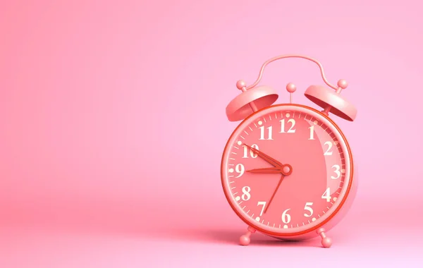 Reloj despertador sobre fondo rosa —  Fotos de Stock