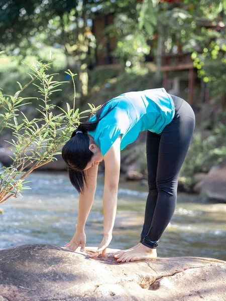 Women yoga sport in park.