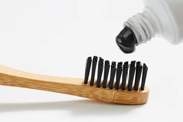 Black Charcoal Toothpaste Squeezing Toothbrush Close — Stock Photo, Image