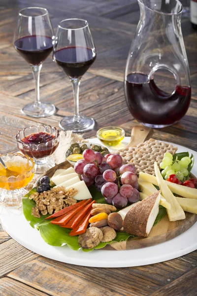 close up view of assorted tasty snacks served on plate