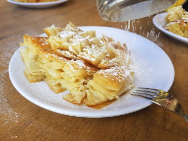 tatlı pasta pudra şekeri ile görünümünü kapat