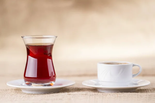 Закрыть Вид Чашки Чая Кофе Фоне Мешковины — стоковое фото