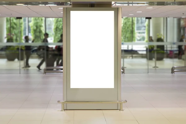 Blank mock up of vertical street poster billboard on Airport Background with plane passengers