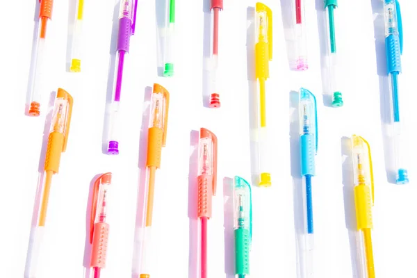 Colorful gel pens pattern on a white background — Stock Photo, Image