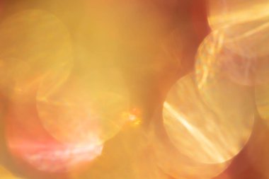 Altın ve kırmızı bulanık Bokeh şenlik arkaplanı