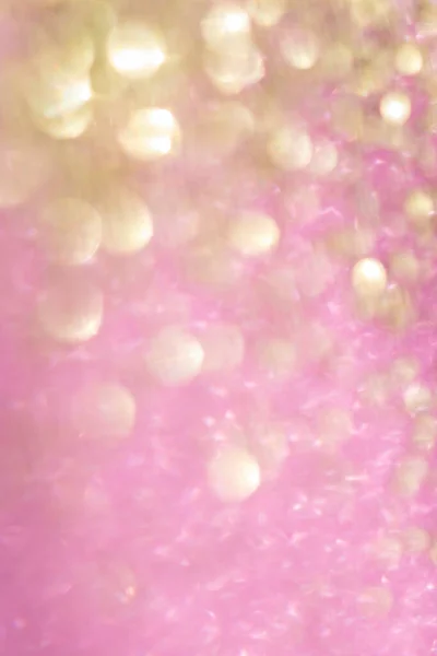 Homályos bokeh háttér rózsaszín és arany csillogás — Stock Fotó