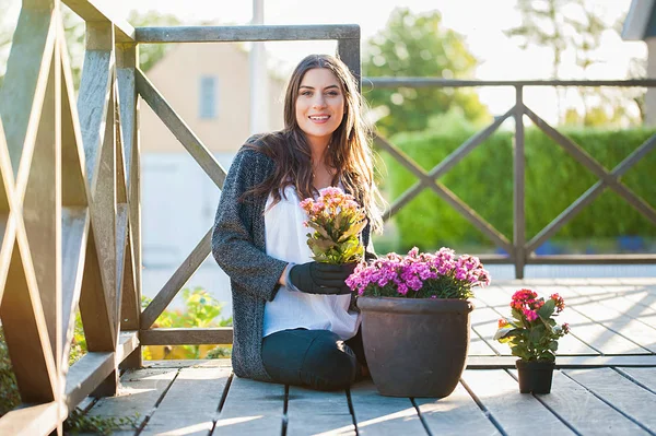 Smiling Young Female Gardening Pots Terrace Home Working Gloves Looking — Stock Photo, Image