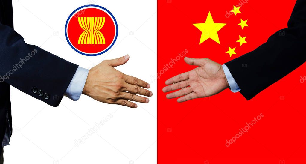 A business man shake each other hand, China and Japan