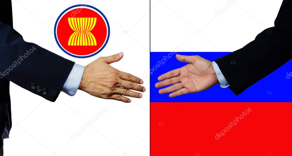 A business man shake each other hand, Russia and AEC