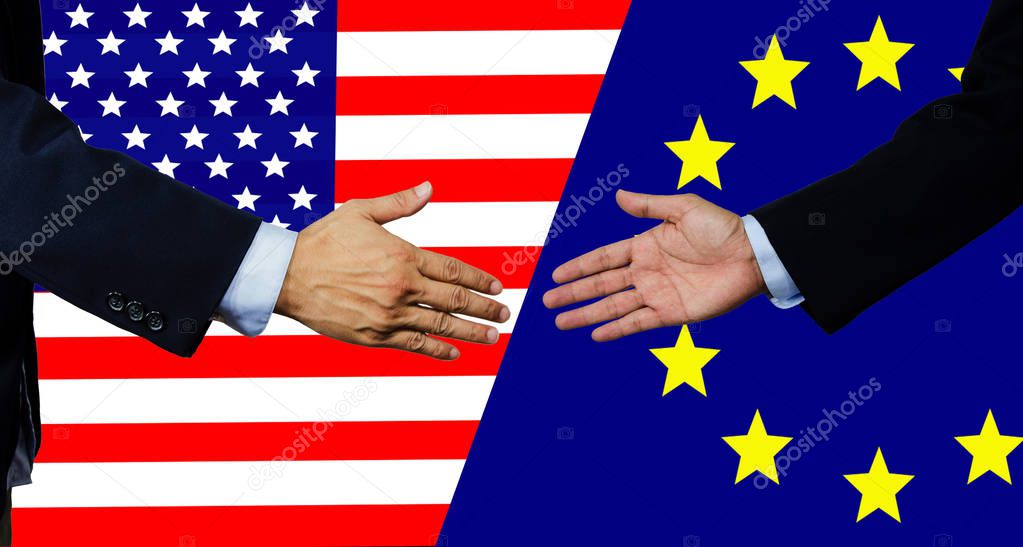 A business man shake each other hand,USA and EU