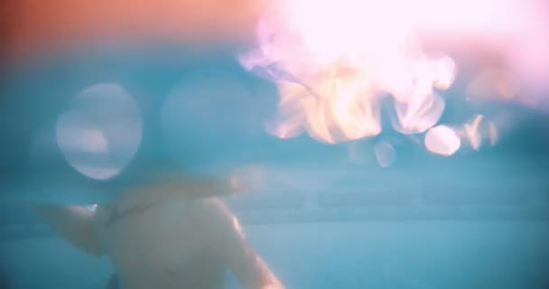 Young boy with goggles making funny faces underwater — Stock Video