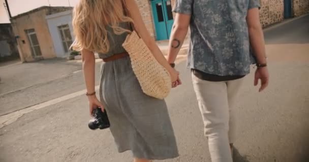 Young tourists couple walking in old town in Europe — Stock Video