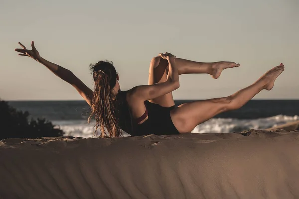 Side View Woman Training Yoga Pose Empty Sandy Seashore Sunlight — Stock Photo, Image