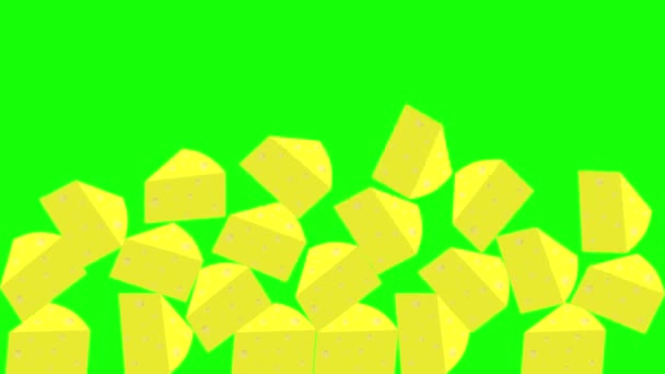 Pionowa animacja plasterków żółtego spadającego sera. zielony tło chromakey — Wideo stockowe