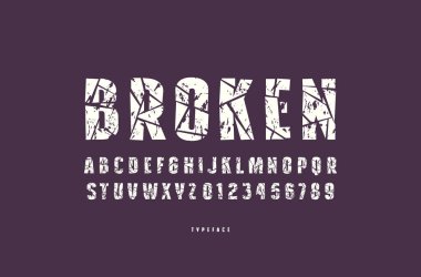 Dekoratif sans serif yazı tipi ile kırık yüz. Harf ve rakam askeri, spor, retro logo ve başlık tasarımı için kaba tekstürlü. Siyah arka plan üzerine beyaz yazı tipi