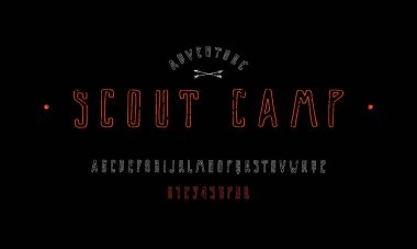 El yapımı grafikle daraltılmış serif yazı tipi yok. Logo ve tişört tasarımı için kaba desenli içi boş harfler ve numaralar. Siyah arkaplanda renk izi