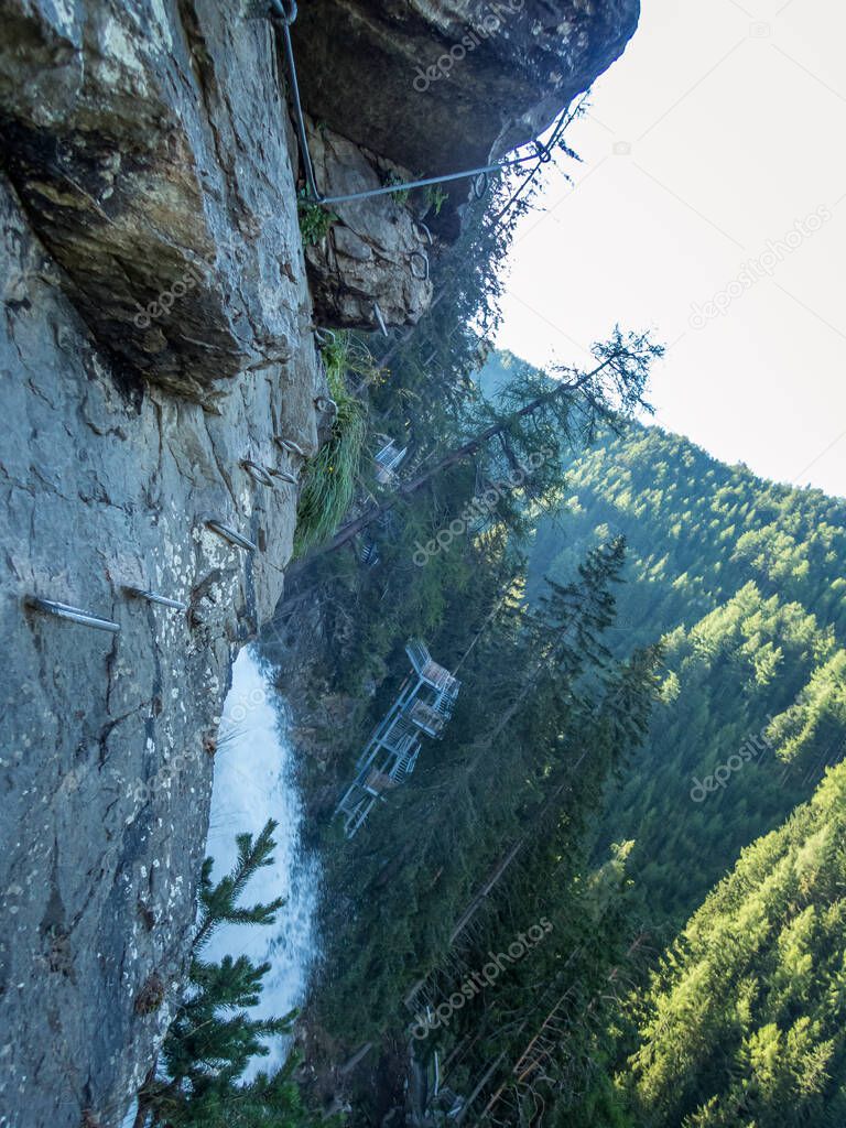 Climbing on the Stuibenfall via ferrata near Umhausen in the Otztal, Tyrol, Austria