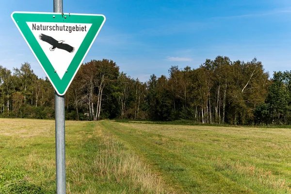 nature reserve sign board in pfrunger wilhelmsdorfer ried, upper swabia germany