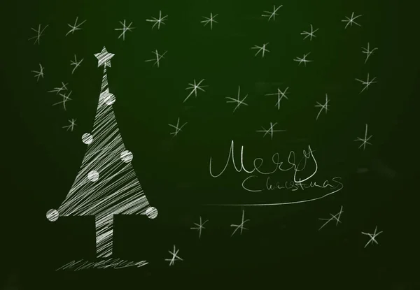 Merry Christmas  written green chalk table with a tree shape and snow.