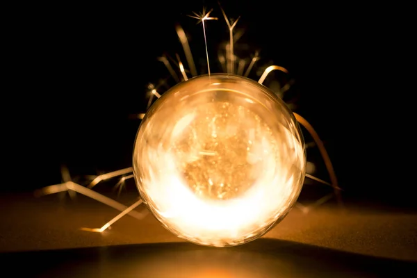 Burning Sparkler Glass Ball Black Background — Stock Photo, Image