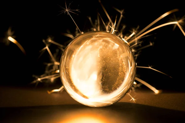 Burning Sparkler Glass Ball Black Background — Stock Photo, Image