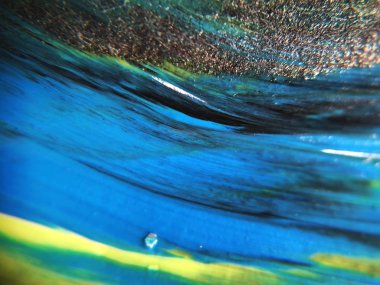 Mavi, yeşil ve sarı renkli soyut boya arka plan doku.