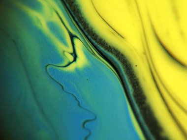 Mavi, yeşil ve sarı renkli soyut boya arka plan doku.