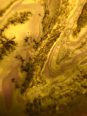 Altın renkli soyut boya arka plan doku.