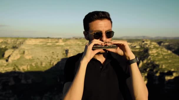 Young Man Sunglasses Playing Harmonica Evening Ulubey Canyon Usak Turkey — Stock Video