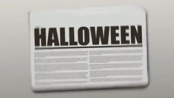 Rotační noviny s textem, který je Halloween.