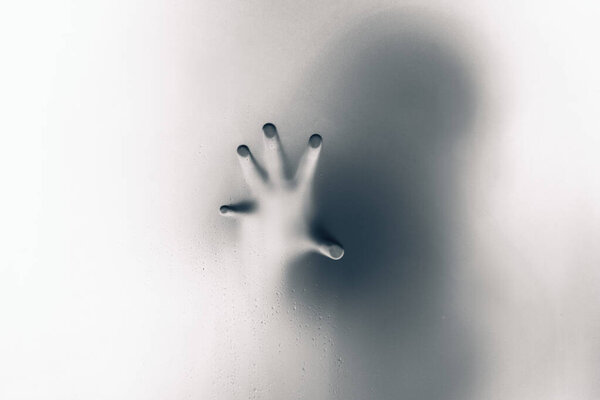 Inversed  color version of Creepy man holding the frosted glass 