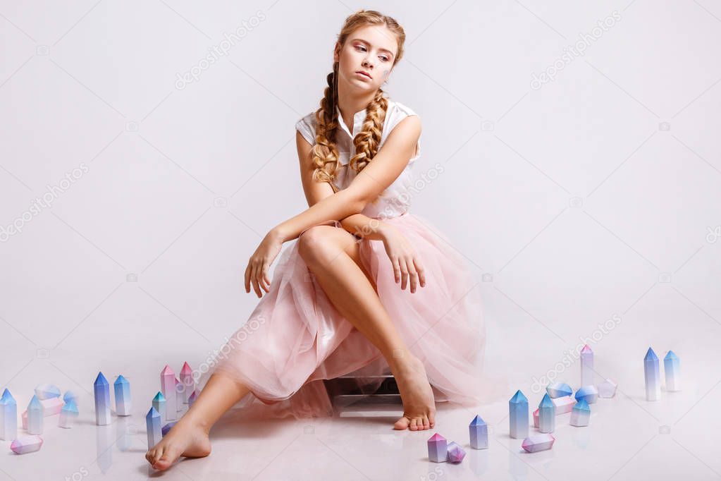 Charming teenager girl in studio, makeup Glitter, origami and minimalism Pastel tones, closeup, studio lighting, retouched.